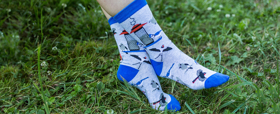 Woman lounging in cute bird socks