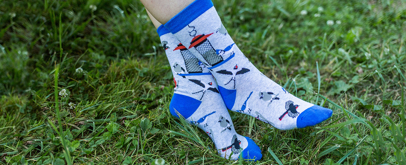 Woman lounging in cute bird socks